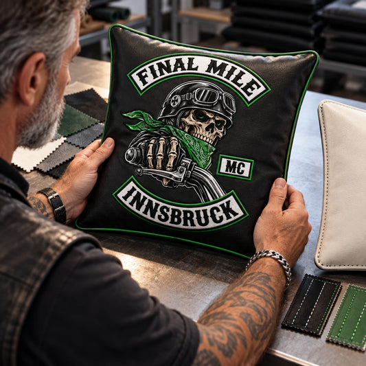 Motorcycle club logo cushion sample displayed with fabric and stitching options.