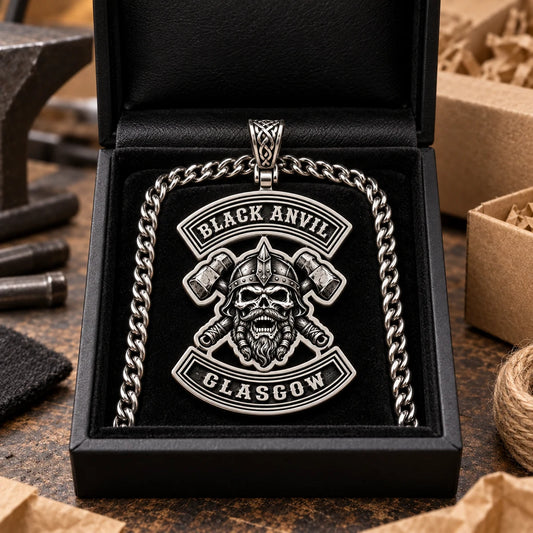 Finished Black Anvil Glasgow motorcycle club stainless steel pendant prepared in a presentation box.