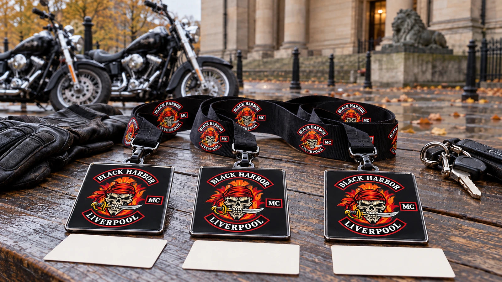 Black Harbor Liverpool motorcycle club logo lanyards prepared off the bike for a Museum LIVE parking-area role handoff