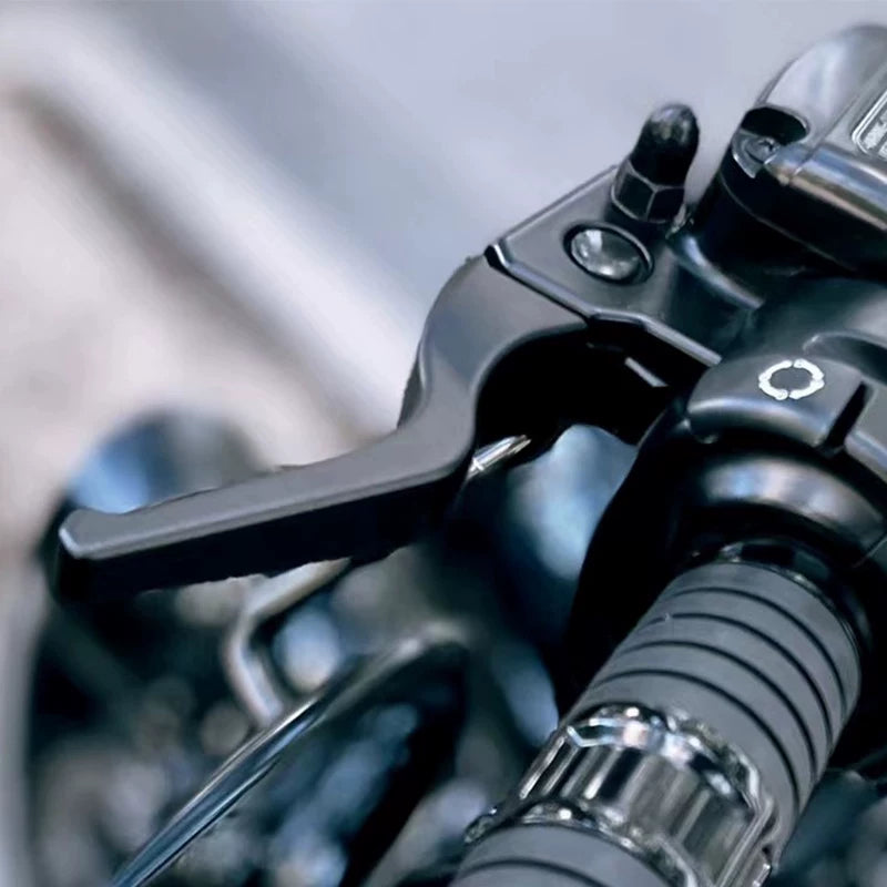 Black BLACK3 3-finger lever installed on motorcycle