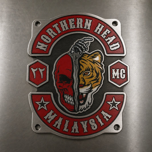 Brushed-metal motorcycle club sign showing directional grain and an approved emblem.