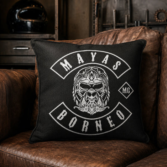 Rugged canvas motorcycle club cushion with a custom logo in an industrial clubhouse.