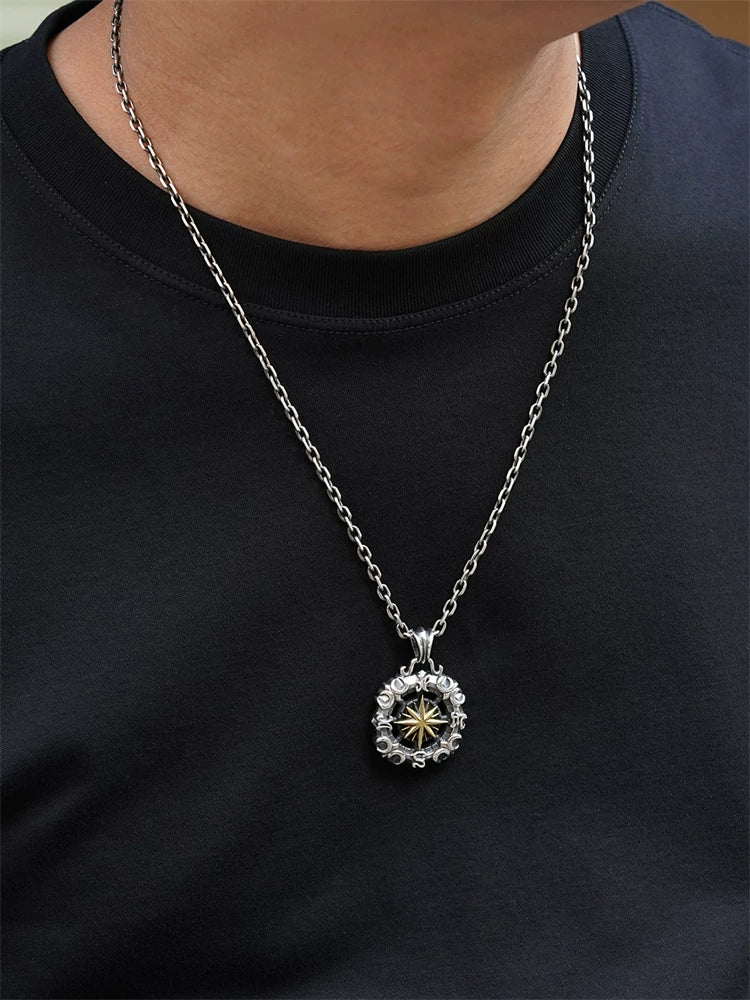 Celestial compass biker pendant shown worn for scale