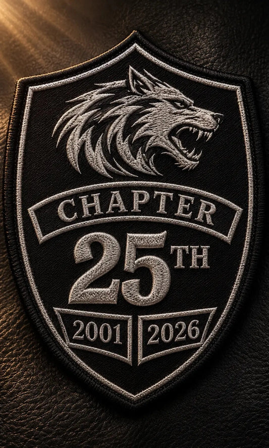 Vertical embroidered motorcycle club chapter anniversary shield patch with club logo, 25th milestone and years 2001–2026.