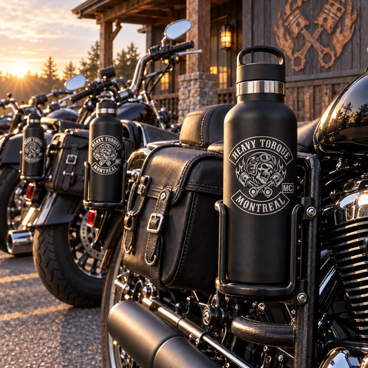 coordinated logo bottles secured beside parked V-twin motorcycles before a chapter run, no humans for a motorcycle club.