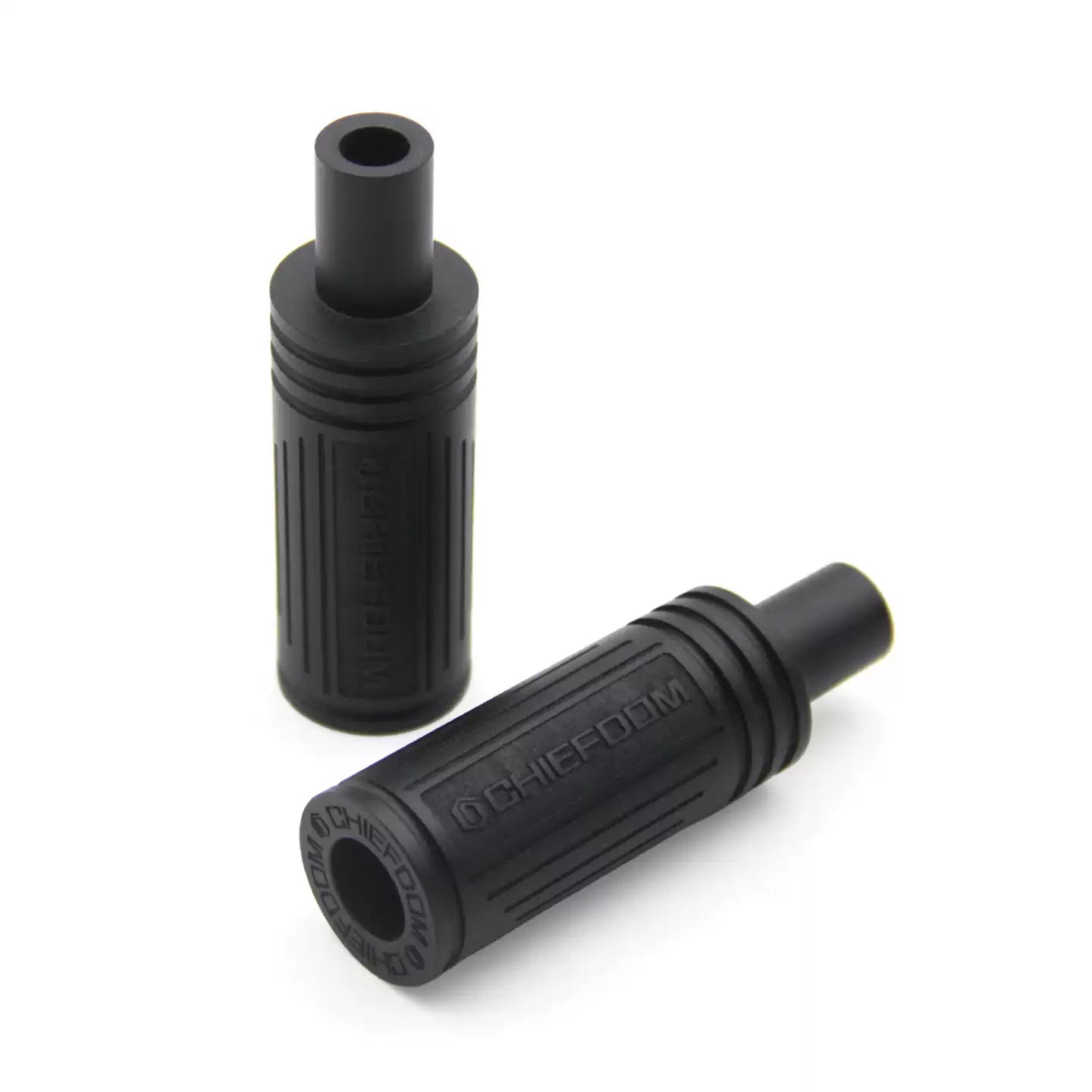 Close-up of two black Chiefdom front fork auxiliary light mount inserts