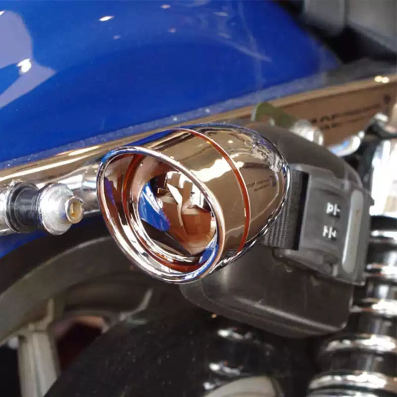 Close-up of a chrome Harley-Davidson turn signal housing