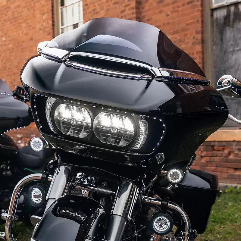 Ciro 45103 LED headlight outline strip installed on a black Harley Road Glide