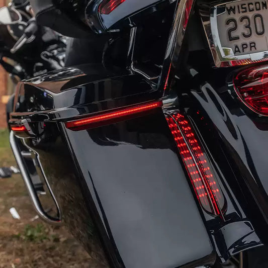 Harley touring motorcycle with Ciro sequential saddlebag LED lights illuminated
