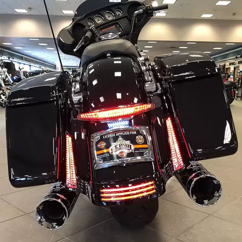 Ciro vertical rear fender filler LED lights installed beside Harley Touring saddlebags