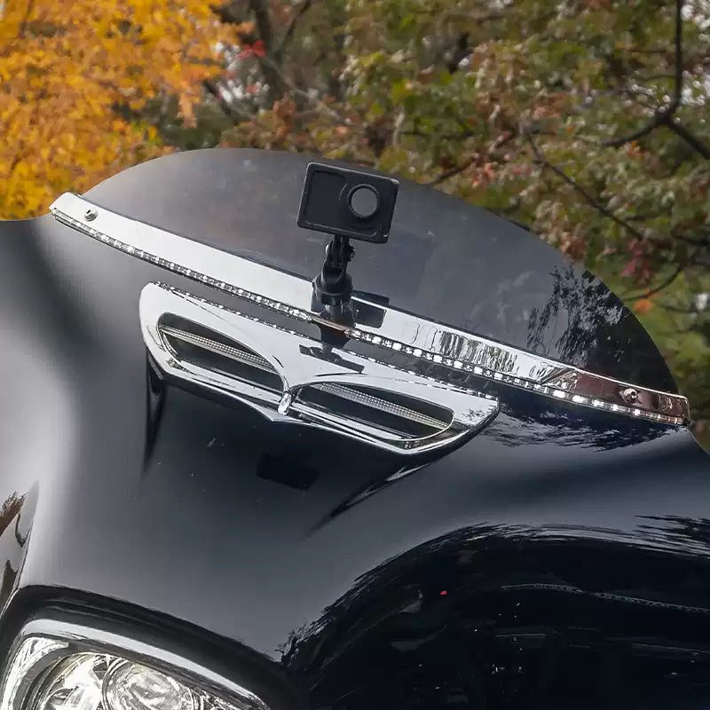 Chrome Ciro LED windshield trim mounted across a Harley touring windshield