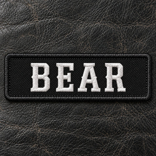Classic straight rectangular embroidered motorcycle club name bar in a clean product close-up, showing custom motorcycle club name bar patch options.