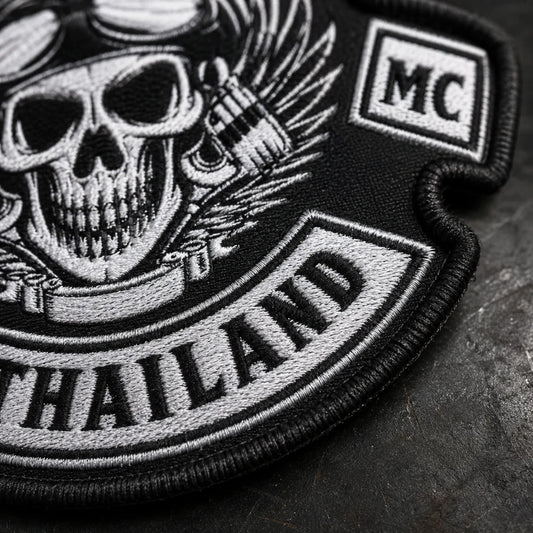 Clean finished border on a shaped motorcycle club back patch.