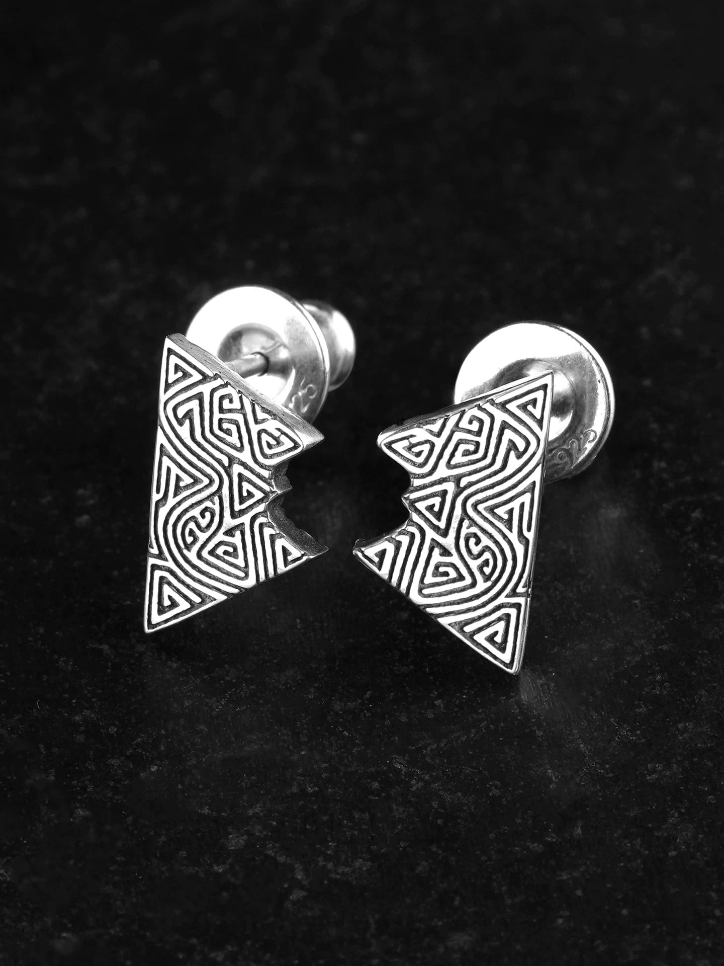 Pair view of cloud thunder triangle sterling silver biker earrings