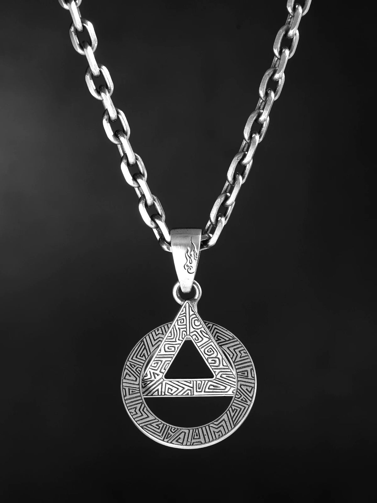 Cloud thunder triangle sterling silver pendant shown on chain