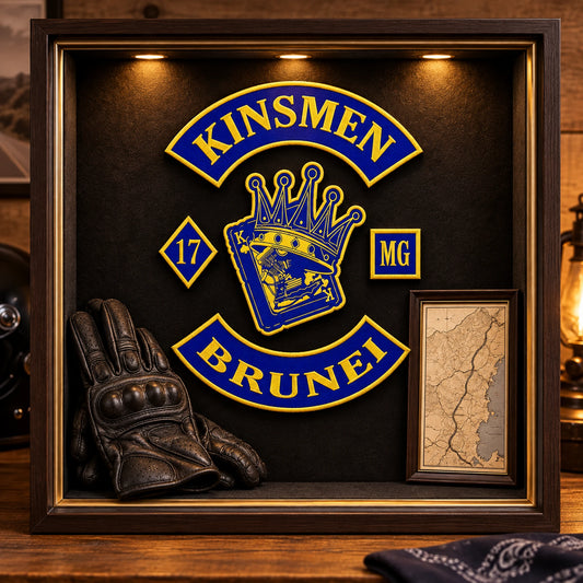 Motorcycle club memorial patch preserved in a respectful clubhouse display.