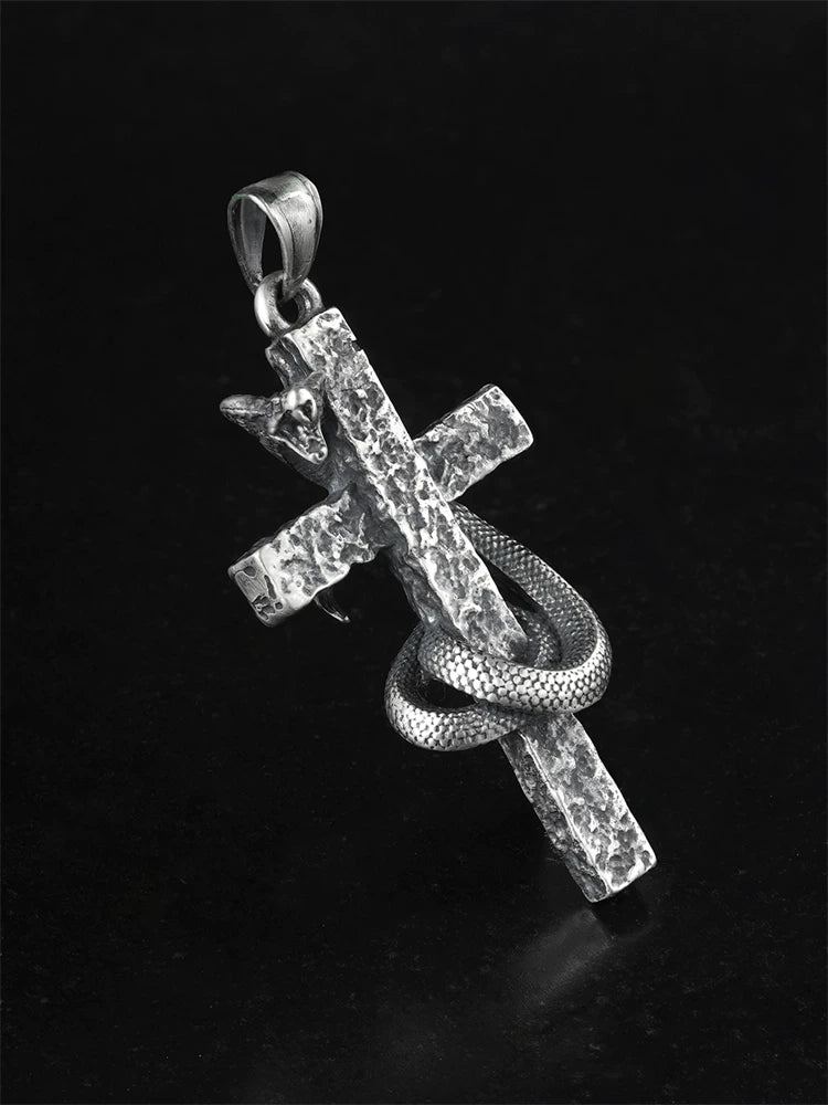 Back view of handcrafted cobra cross silver pendant