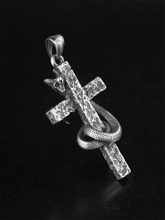 Back view of handcrafted cobra cross silver pendant