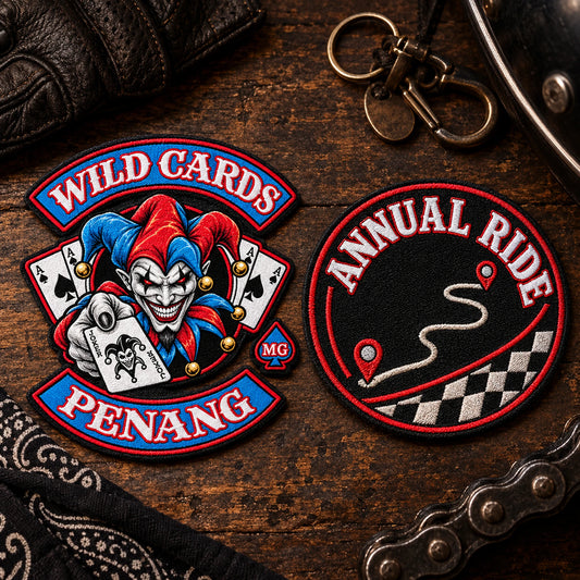Compact embroidered motorcycle ride event patch with fictional date and route symbol for a motorcycle club, shown at dark rally memorabilia table.