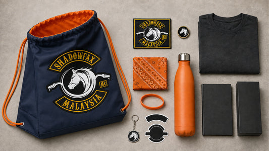 Complete motorcycle rally registration kit arranged beside an open custom club-logo drawstring bag.