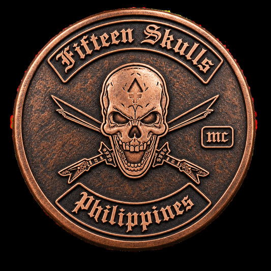 Copper motorcycle club metal gear with red-brown color and naturally darkened recessed details.