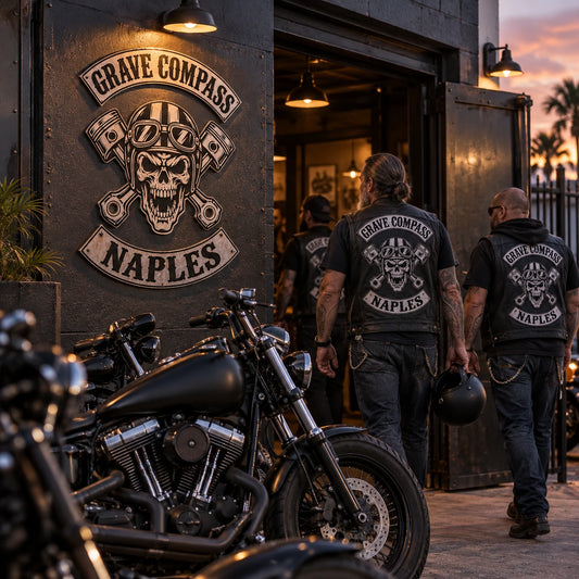 Custom motorcycle club entrance sign identifying a chapter meeting space at dusk.