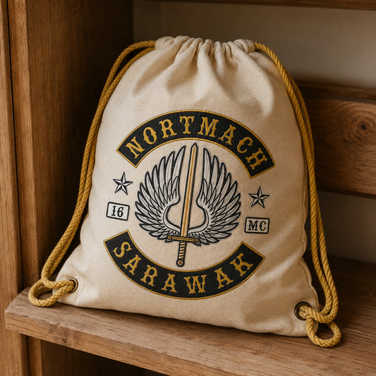 Natural cotton motorcycle club drawstring bag displayed as heritage-style club merchandise.