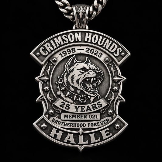 Reverse of a Crimson Hounds motorcycle club 25th anniversary pendant with member and commemorative engraving.