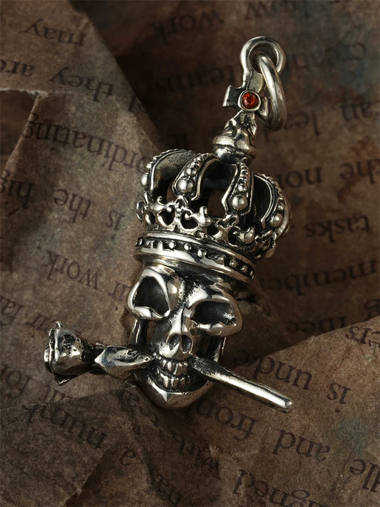 Front view of crowned skull rose sterling silver biker pendant