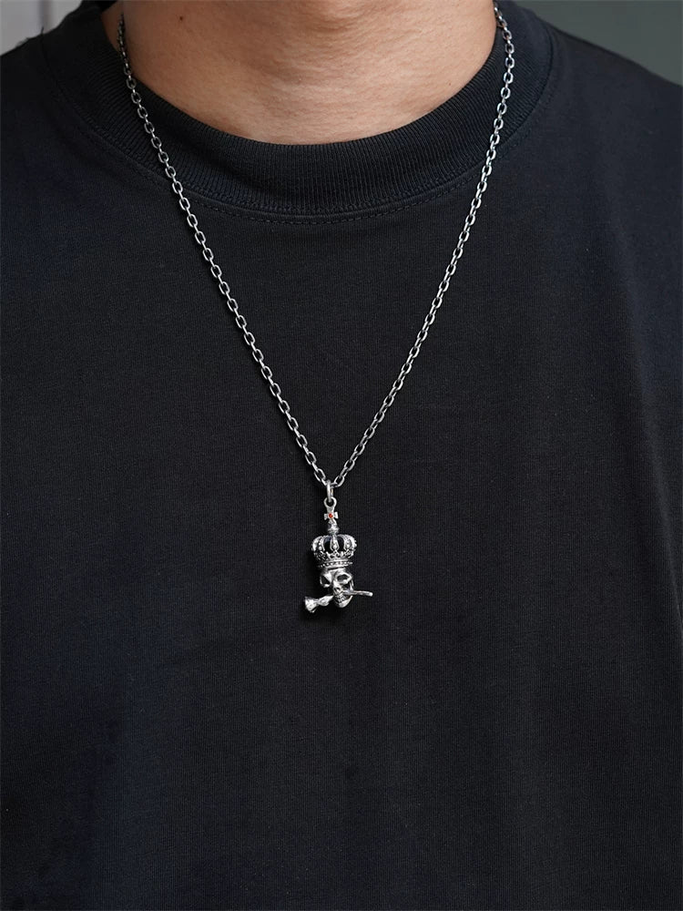 Crowned skull rose sterling silver pendant worn on chain