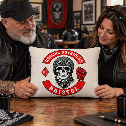 Chapter officers review a custom motorcycle club pillow adapted for their chapter.