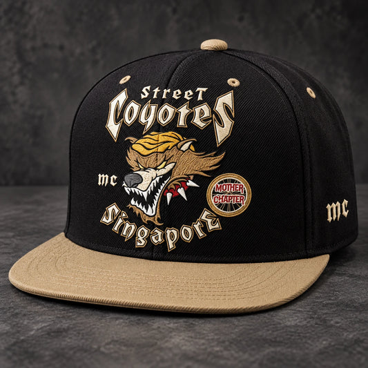 Black and tan motorcycle club flat-brim cap with coordinated embroidered club artwork across the front and side.