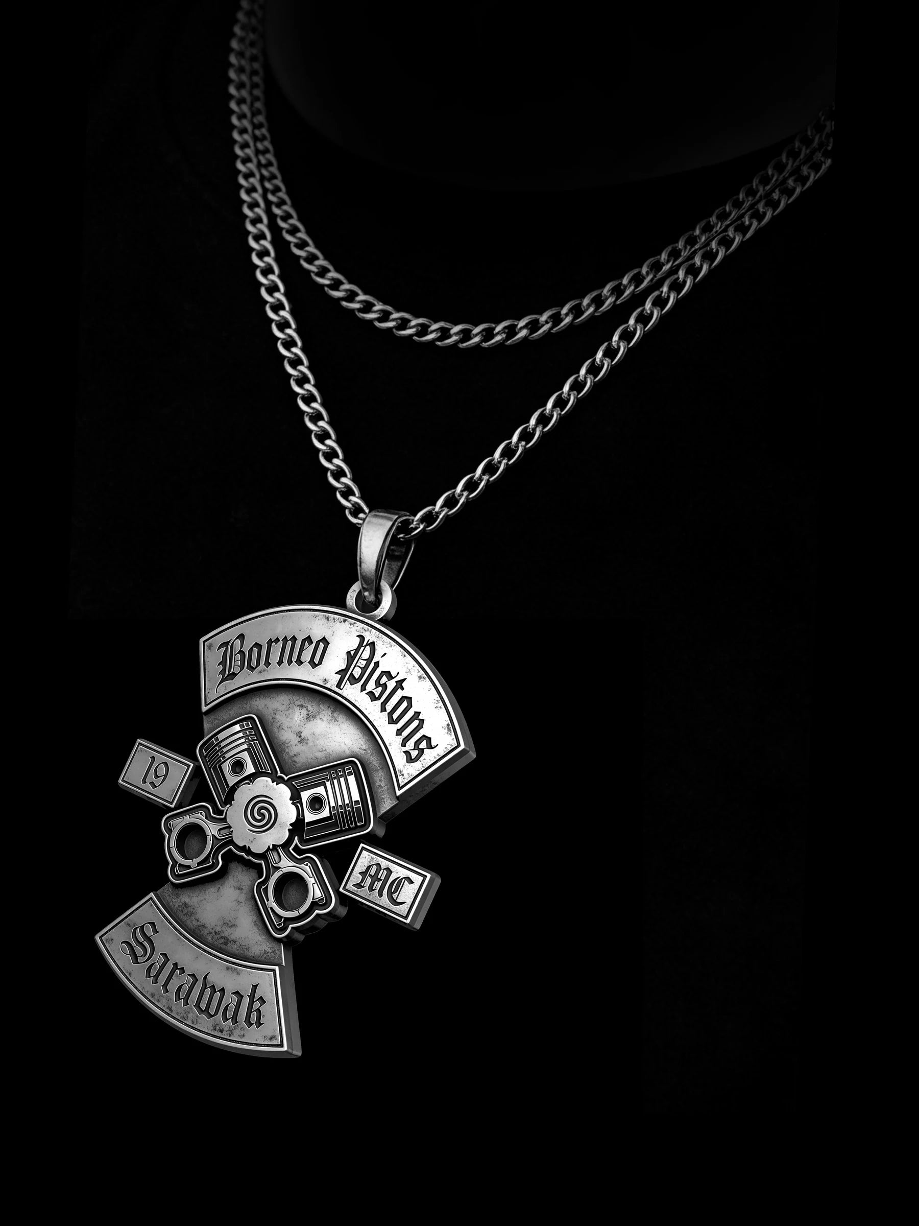 Custom crossed pistons motorcycle club pendant craftsmanship reference, side profile