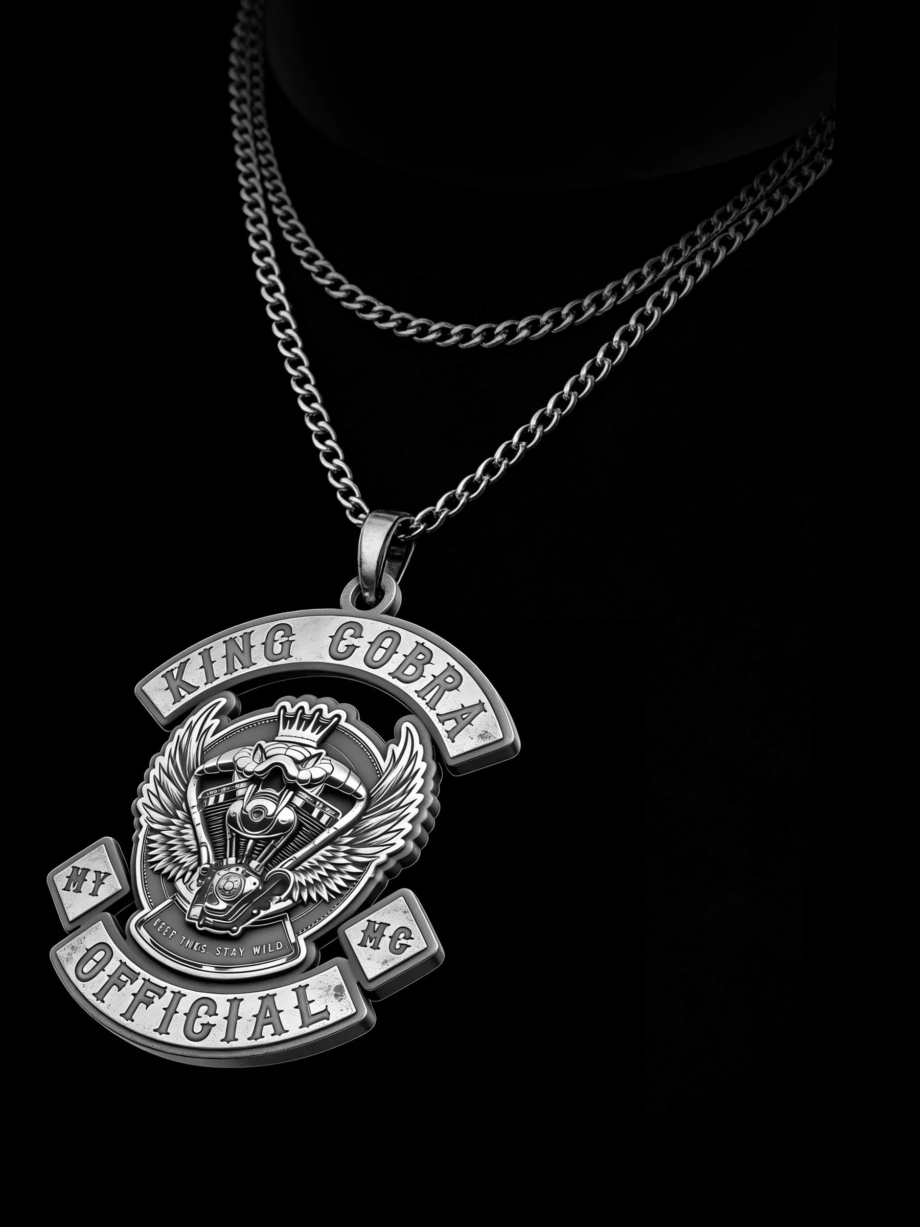 Custom crowned cobra motorcycle club pendant craftsmanship reference, raised relief detail