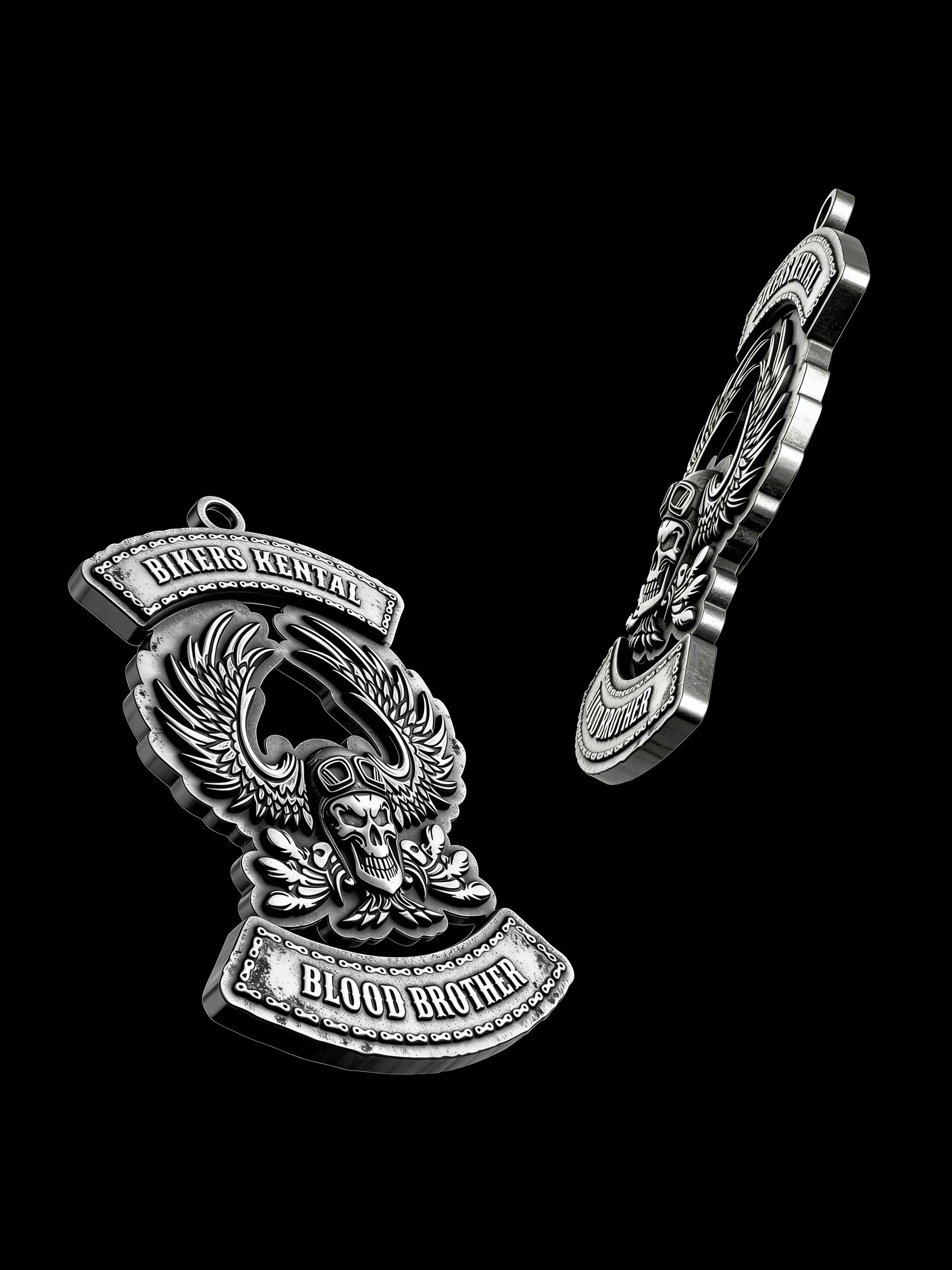 Custom flaming winged skull motorcycle club pendant craftsmanship reference, raised relief detail