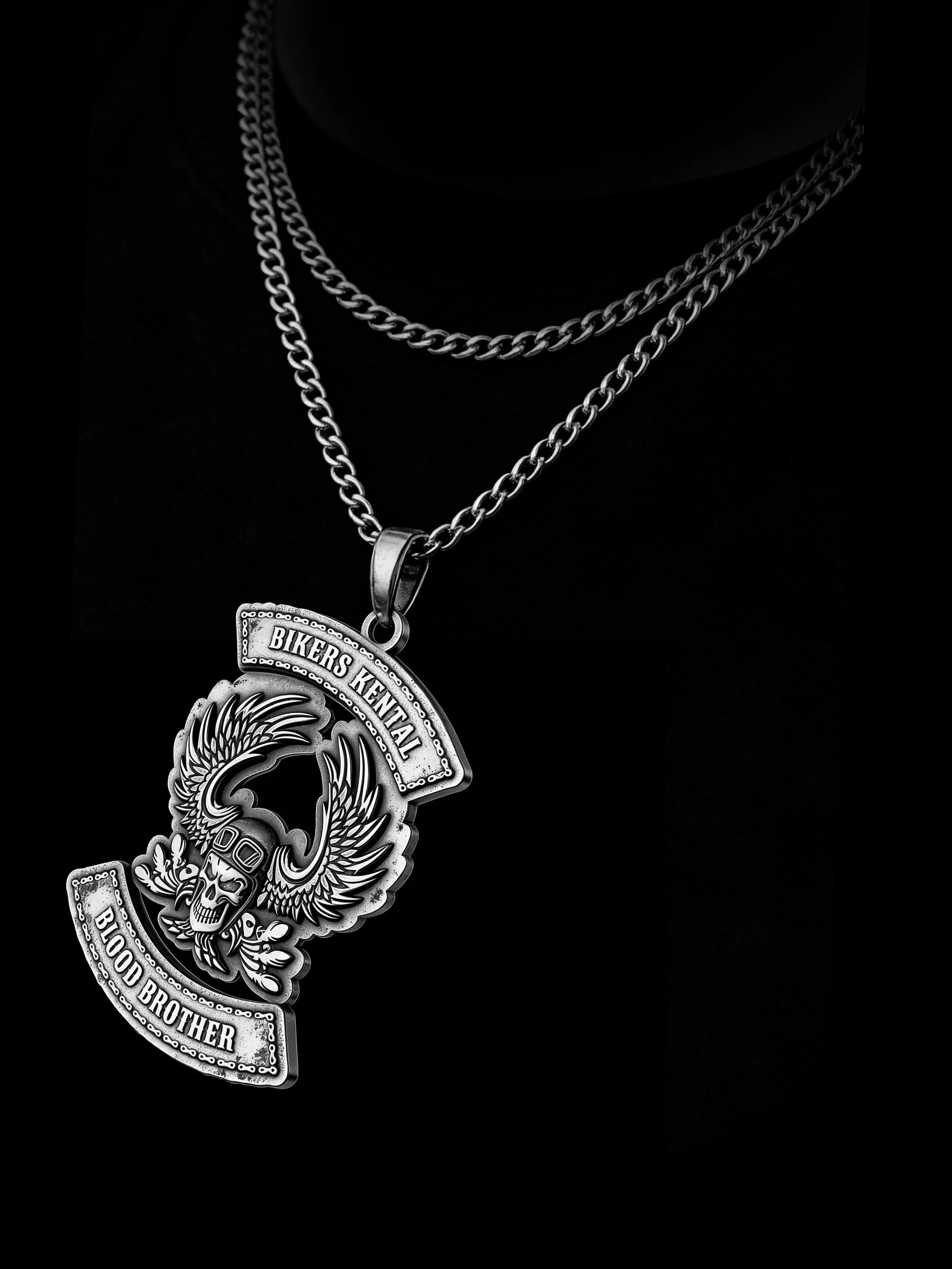 Custom flaming winged skull motorcycle club pendant craftsmanship reference, side profile