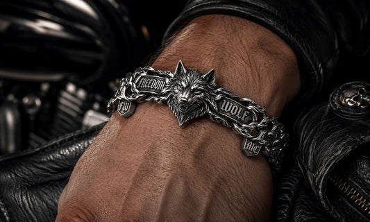 Custom 925 sterling silver Freedom Wolf Chiangmai MC biker bracelet featuring a sculpted wolf head, fur-inspired custom links, Freedom and Wolf identity links, Chiangmai engraving, and subtle FW and MC hallmark details in a dark motorcycle club wearing scene.