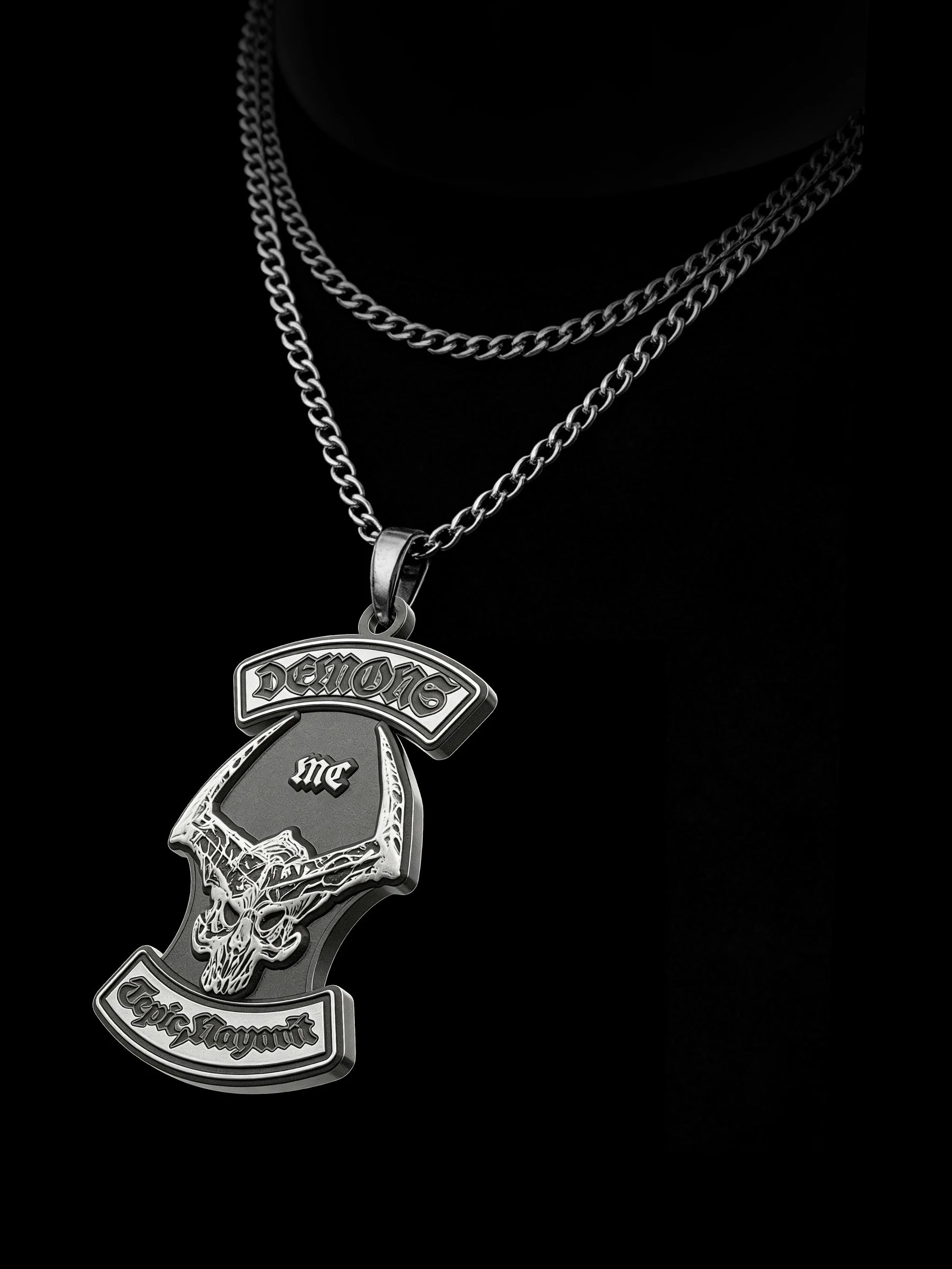 Custom horned skull motorcycle club pendant craftsmanship reference, raised relief detail