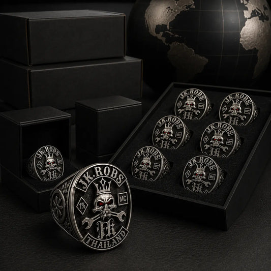 Original motorcycle club ring compared with newly produced matching rings showing consistent logo, size and metal craftsmanship.