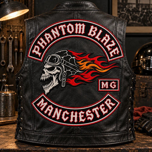 Large custom motorcycle club back patch sewn across the back of a complete black leather vest.