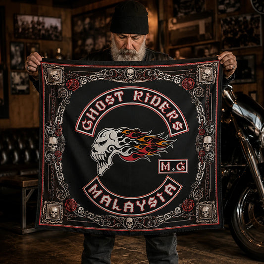 Custom motorcycle club bandana featuring the authorized GHOST RIDERS MG identity in full square bandana held by a mature rider in a dim clubhouse, elaborate border and central identity fully visible.