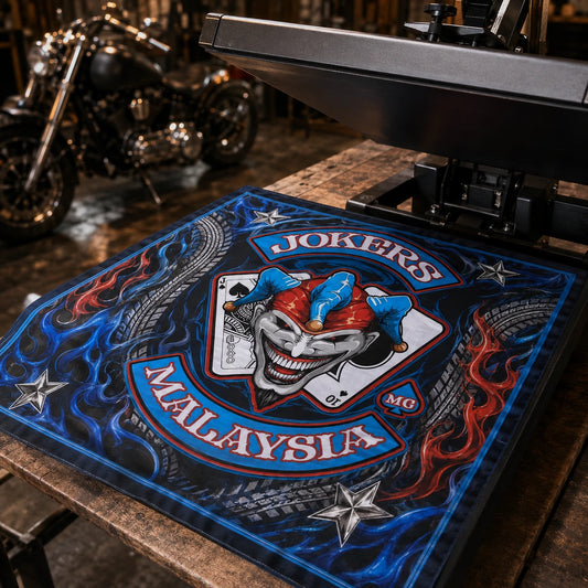 Custom motorcycle club bandana featuring the authorized Jokers MC Malaysia identity in open heat press revealing a saturated edge-to-edge polyester bandana with crisp artwork.
