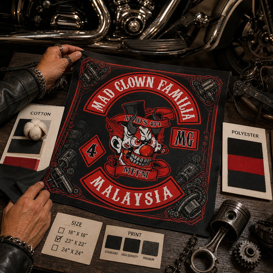 Custom motorcycle club bandana featuring the authorized MAD CLOWN FAMILIA Malaysia identity in hands choosing fabric, size and print samples around a finished club bandana and motorcycle parts.