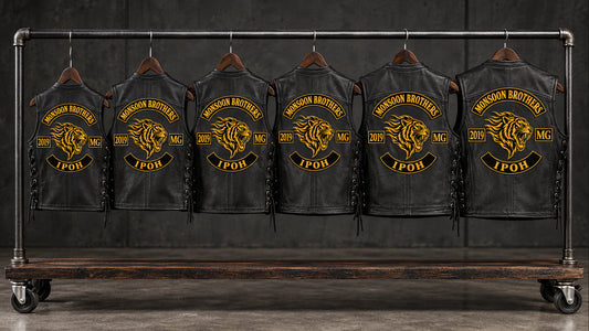 Coordinated black leather biker cuts for a motorcycle club chapter order.