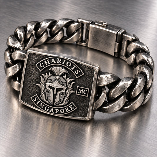 Heavy link motorcycle club bracelet with a solid authorized emblem centerpiece.