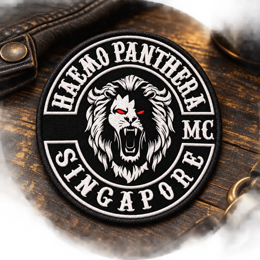 Solid embroidered annual run patch shown for a custom motorcycle club patch system in rally registration table.
