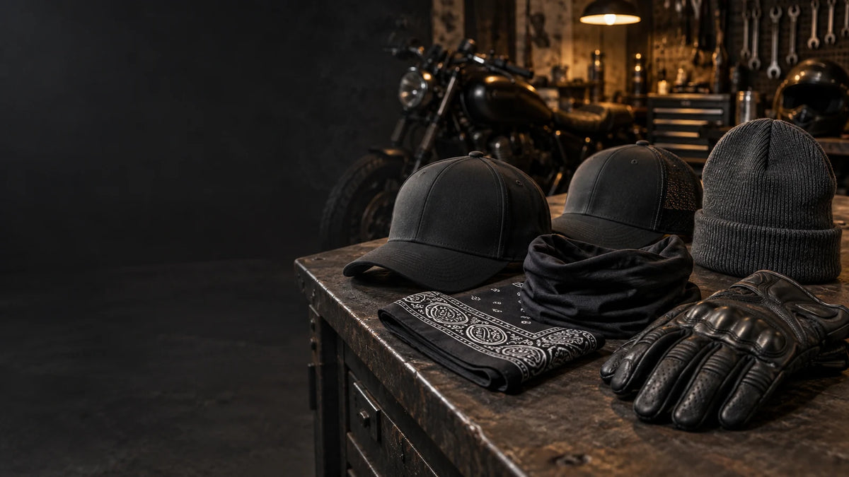 Custom motorcycle club headwear and rider accessories displayed together