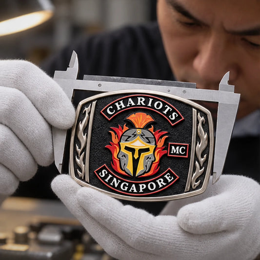 Custom club rings, pendants, buckles and metal gear with an authorized motorcycle club logo shown during sample approval