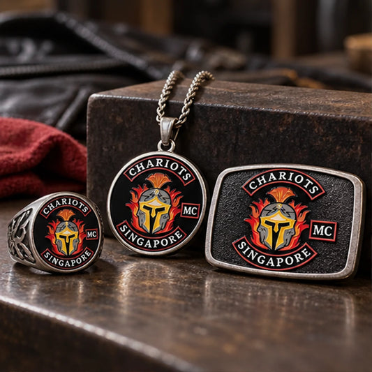 Custom club rings, pendants, buckles and metal gear with an authorized motorcycle club logo arranged for customization planning