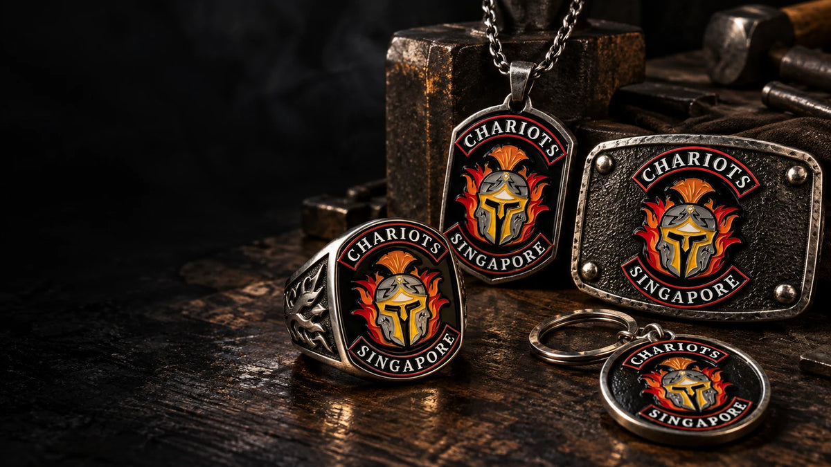 Custom club rings, pendants, buckles and metal gear with an authorized motorcycle club logo displayed as a complete custom collection
